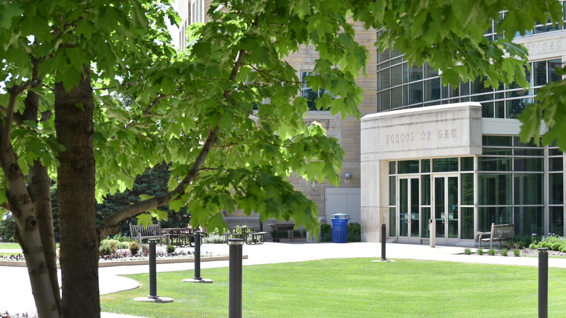 Exterior of the law school building in spring