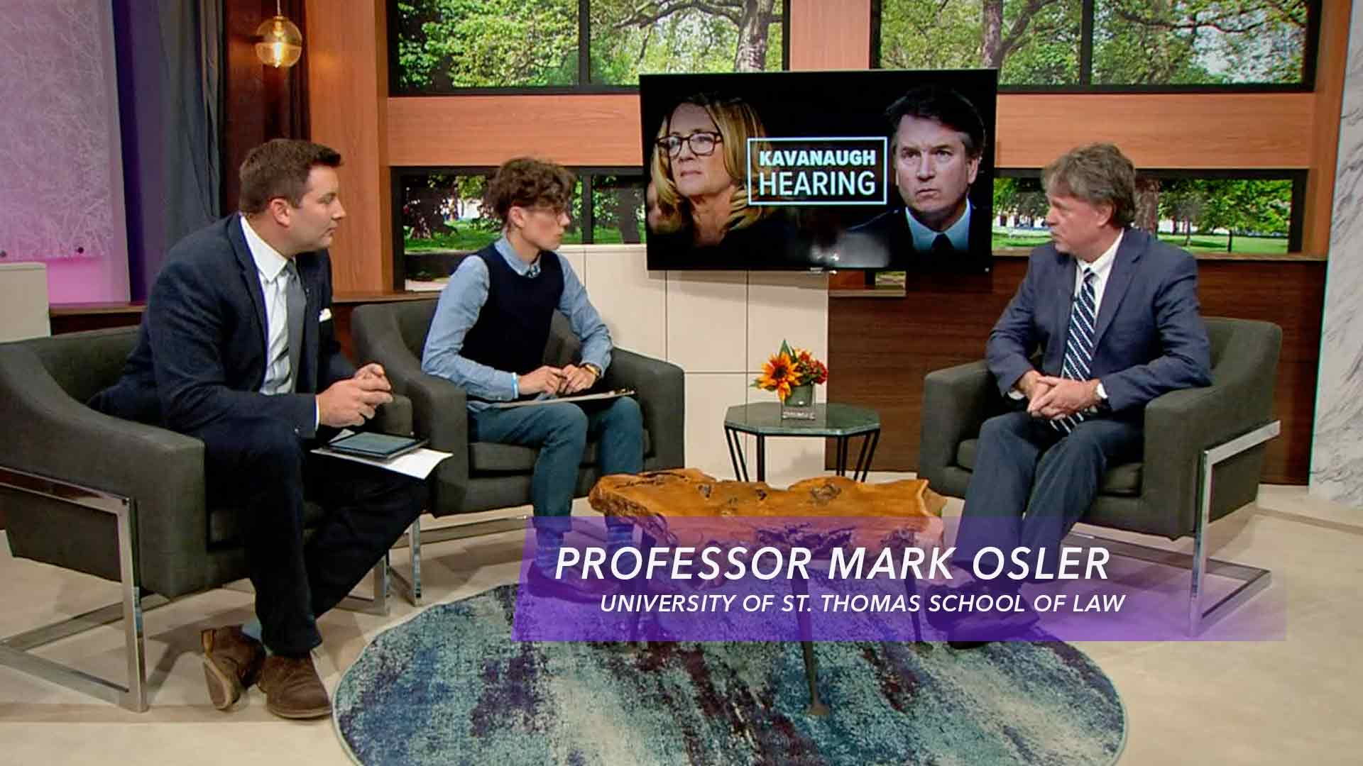 Professor Mark Osler gives a televised interview.