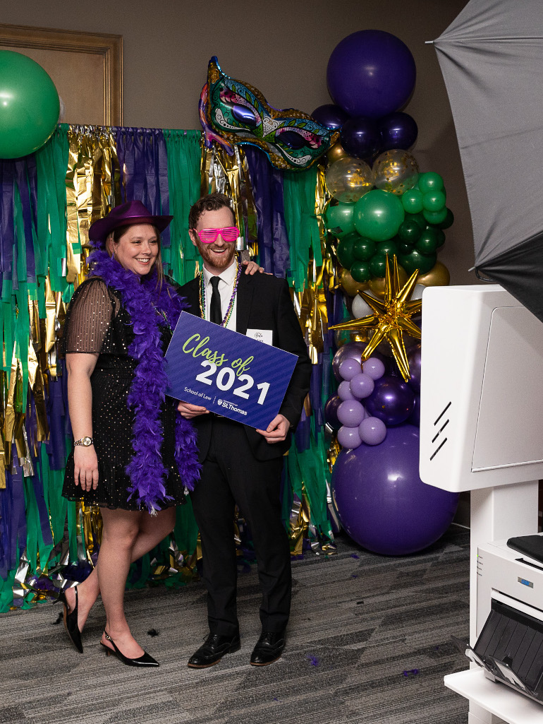 Two Gala guests take a photo in the photo booth
