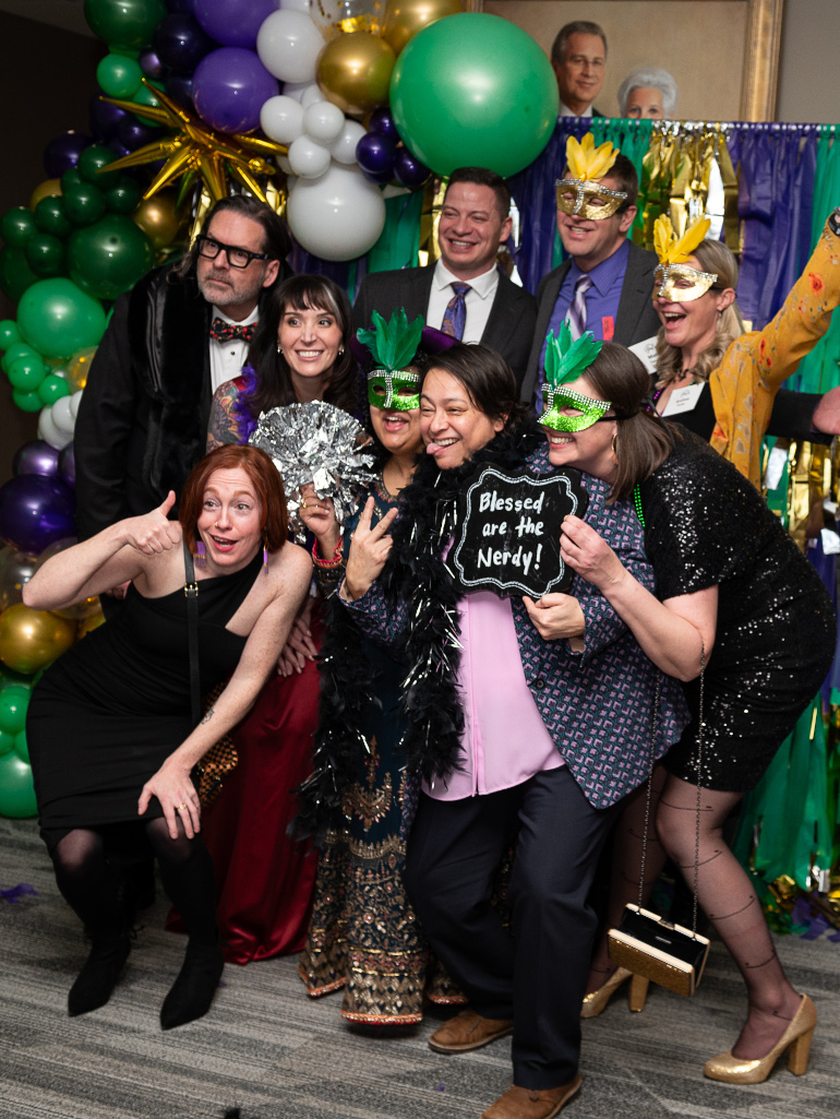 A group of Gala attendees take a photo in the photo booth