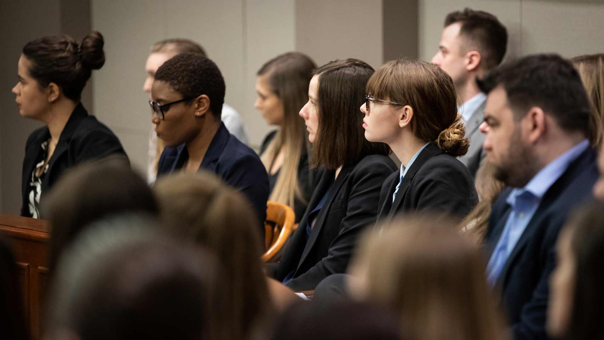law school students watching a speaker