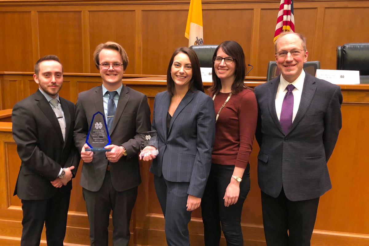 Students with awards at moot court competition