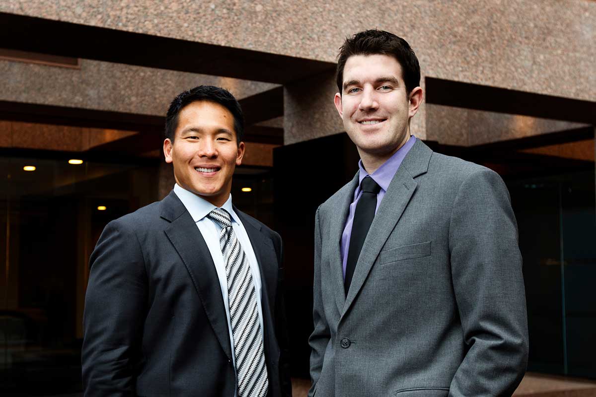 A student stands side-by-side with their School of Law mentor.