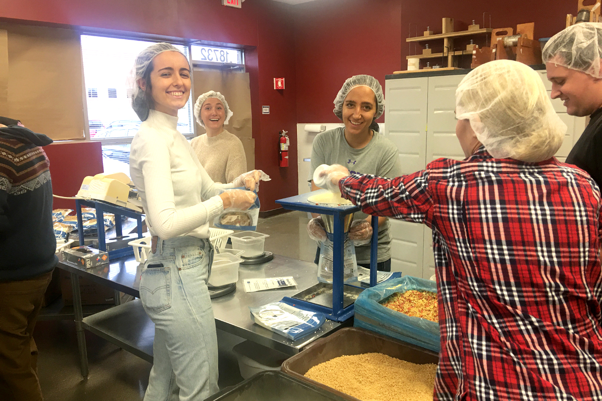 Law Students Pack Food at Feed My Starving Children