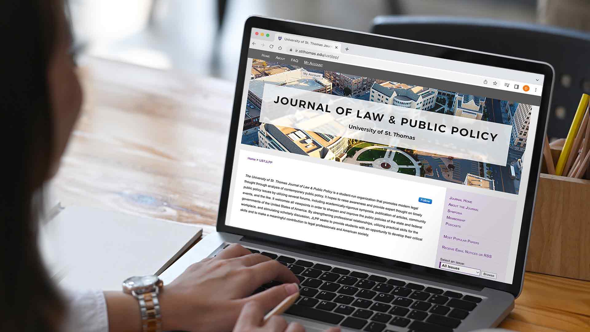 Journal of law on a laptop