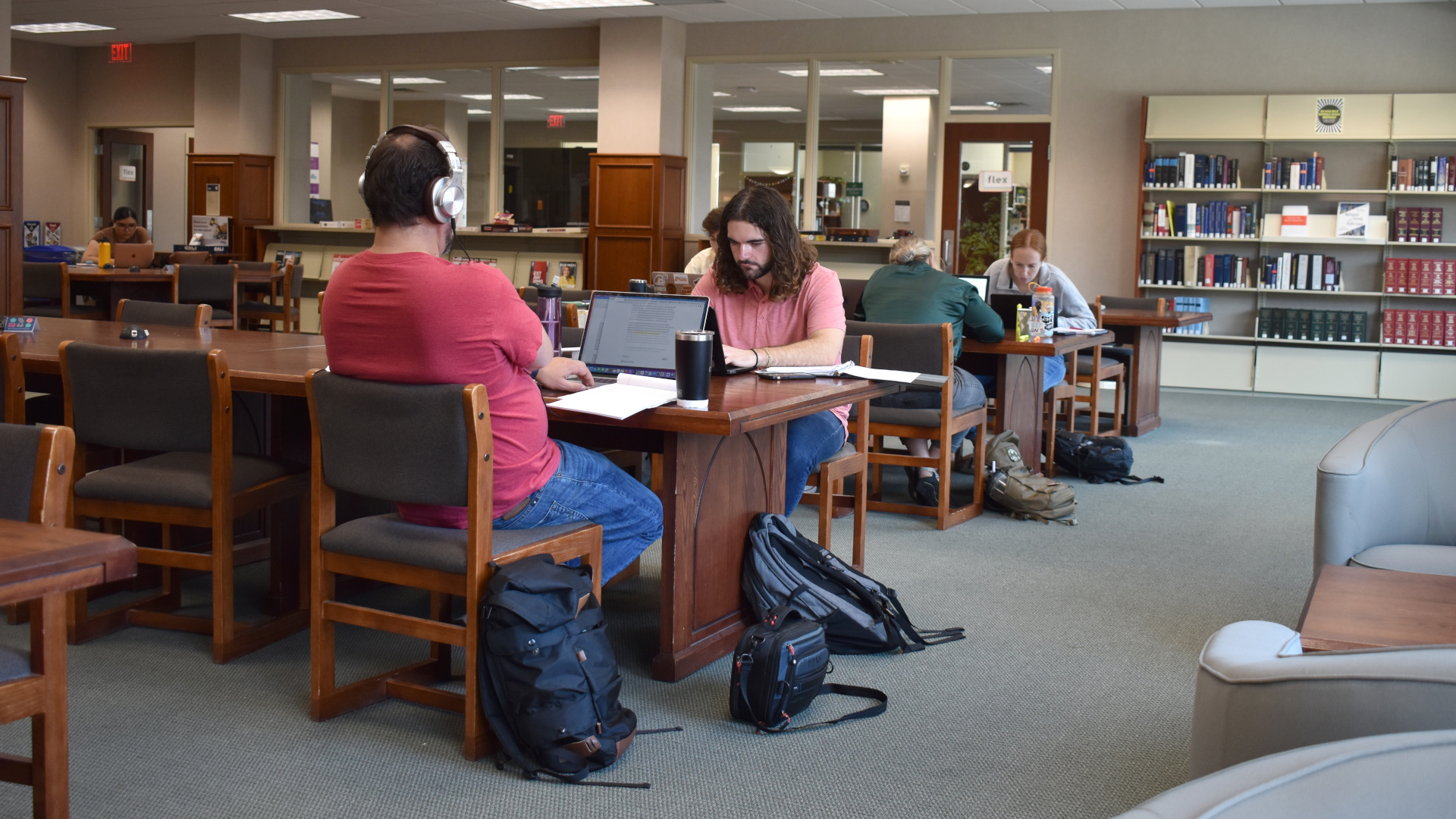 students studying in law library